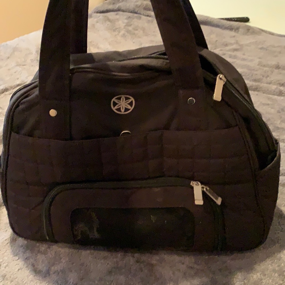 Gym bag with yoga mat strap